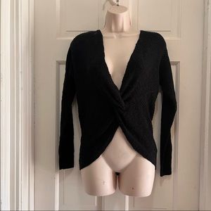 TWO sweaters both size S like new